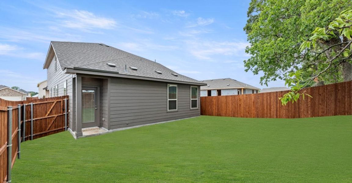 Representative exterior photo of a completed home built from the Willow by Impression Homes in Keeneland, Aubrey, TX (Image 23). Representative exterior photo of a completed home built from the Willow by Impression Homes in Keeneland, Aubrey, TX (Image 23).