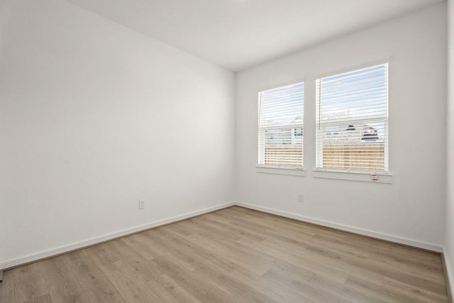 Spacious, unfurnished interior of a new home in Westwood, League City (Image 15).