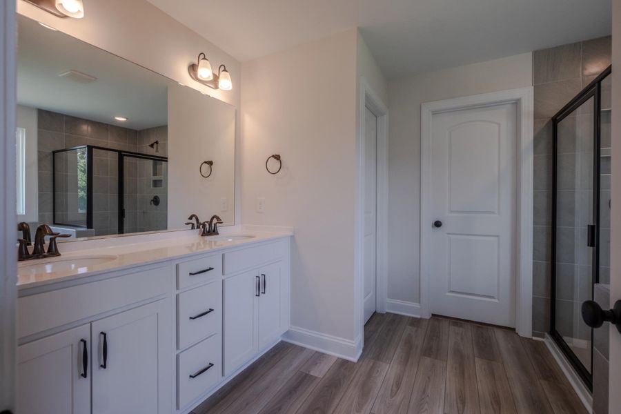 Furnished interior view inside a new home in Cottages at Piper Village, Trinity (Image 11). Furnished interior view inside a new home in Cottages at Piper Village, Trinity (Image 11).