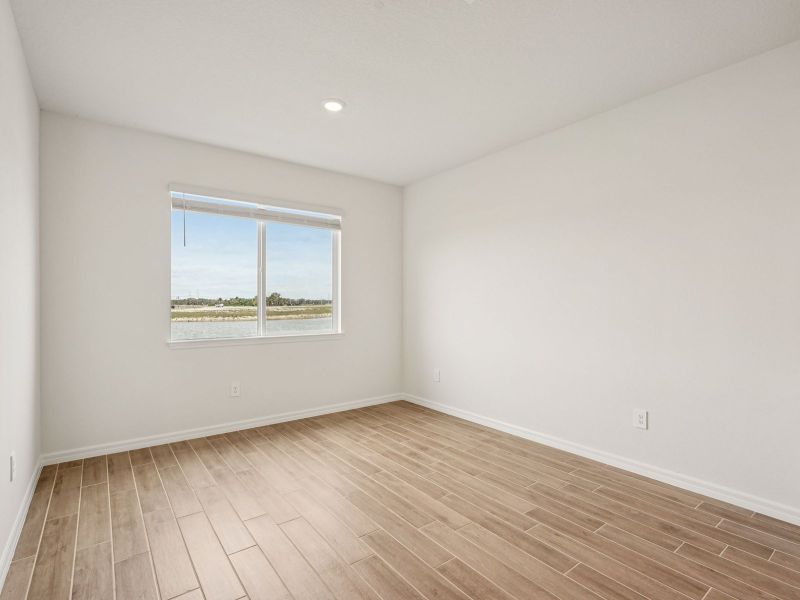 Spacious, unfurnished interior of a new home in Oakfield Trails - Signature Series, Parrish (Image 9). Spacious, unfurnished interior of a new home in Oakfield Trails - Signature Series, Parrish (Image 9).