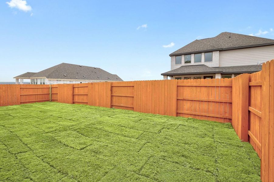 Exterior details and patio area of a home in Lariat, Liberty Hill (Image 3).