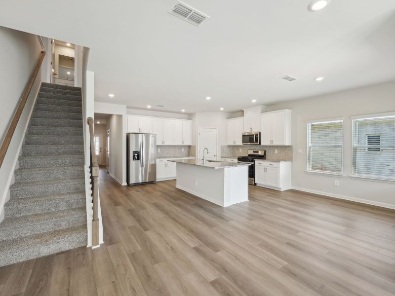 Furnished interior view inside a new home in Martin Springs - Estate Series, Lawrenceville (Image 4).
