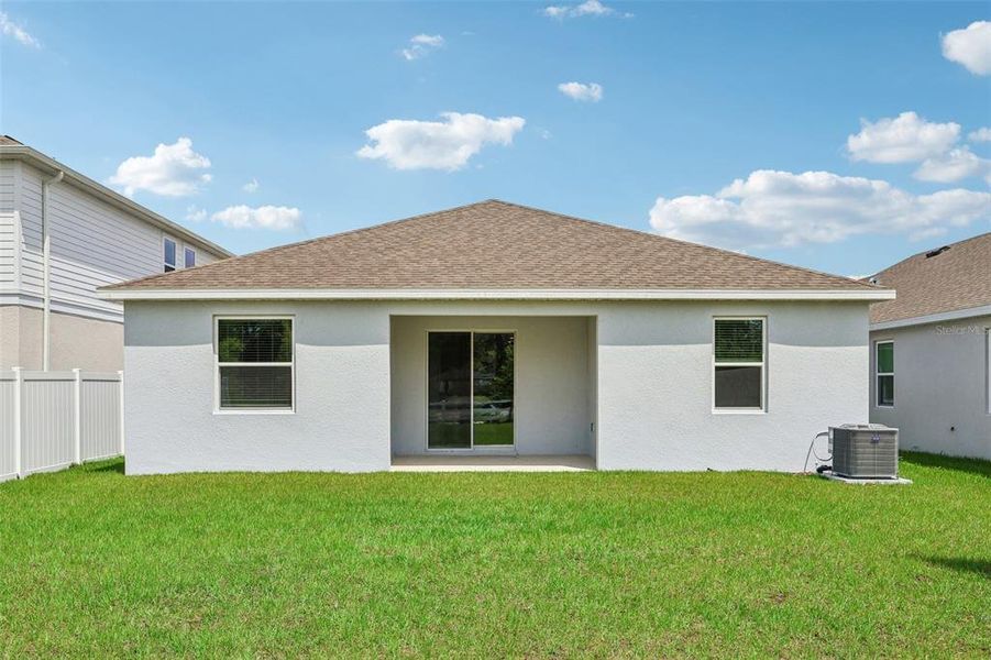 Exterior details and patio area of a home in Brack Ranch, St. Cloud (Image 22).