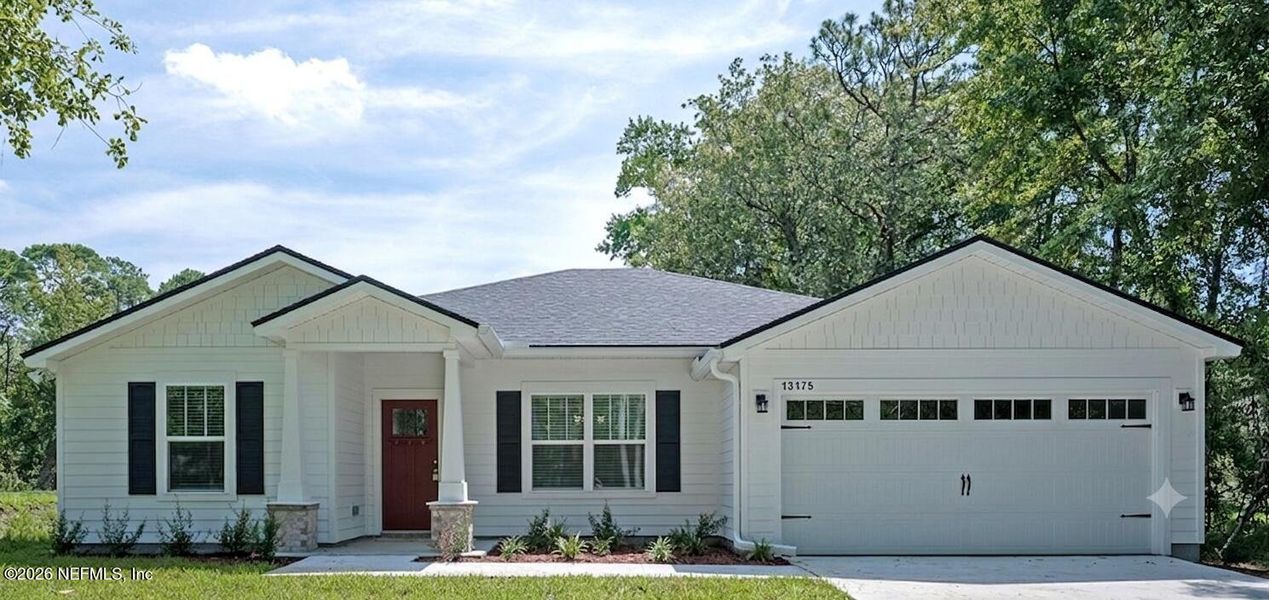 Front exterior of a new home in , Jacksonville, FL, highlighting curb appeal (Image 1). Front exterior of a new home in , Jacksonville, FL, highlighting curb appeal (Image 1).