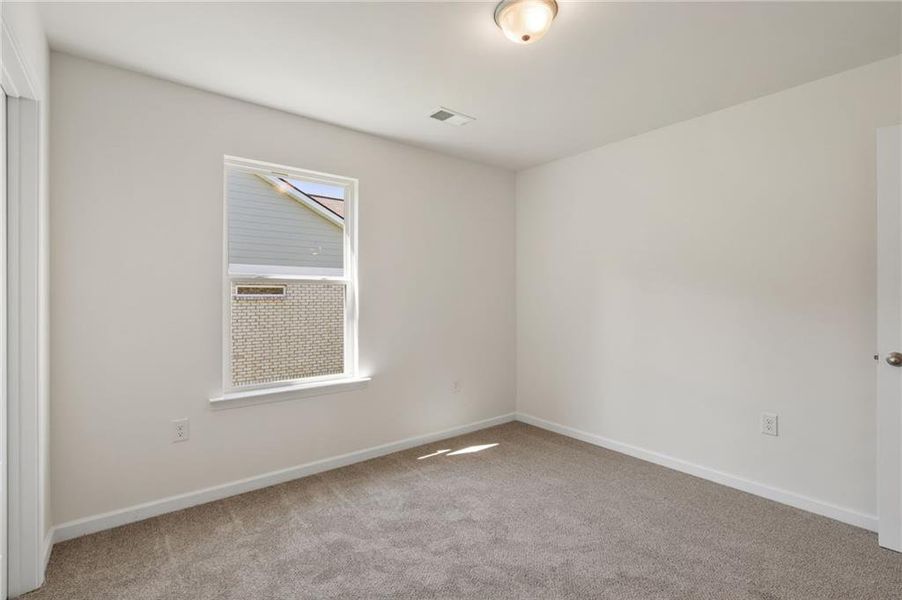 Spacious, unfurnished interior of a new home in The Brooke at Rivertown, South Fulton (Image 22).