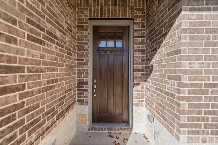Exterior details and patio area of a home in Oak Grove Addition, Springtown (Image 4).