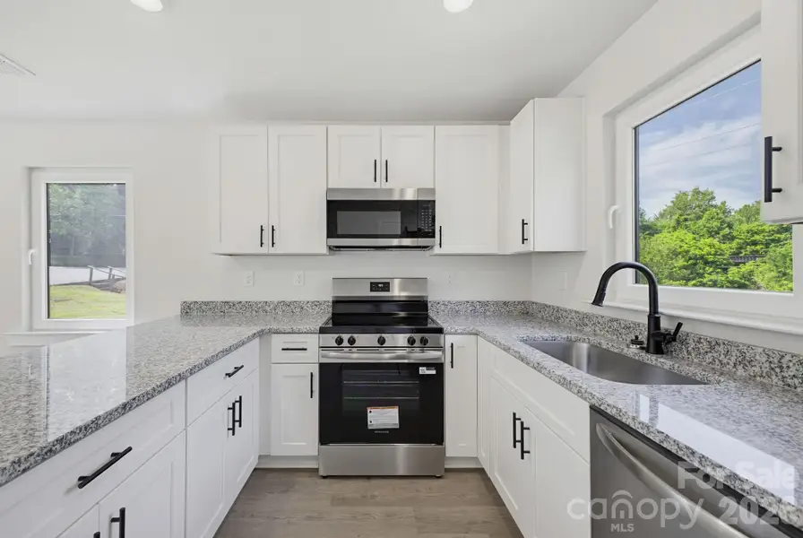 Furnished interior view inside a new home in , Conover (Image 4).
