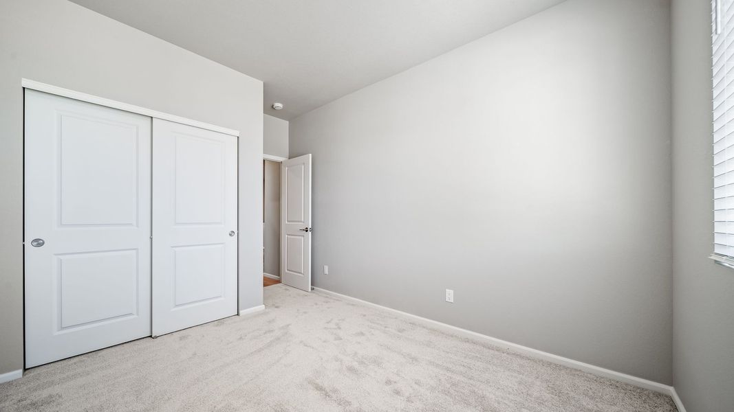 Spacious, unfurnished interior of a new home in Reunion, Commerce City (Image 24). Spacious, unfurnished interior of a new home in Reunion, Commerce City (Image 24).