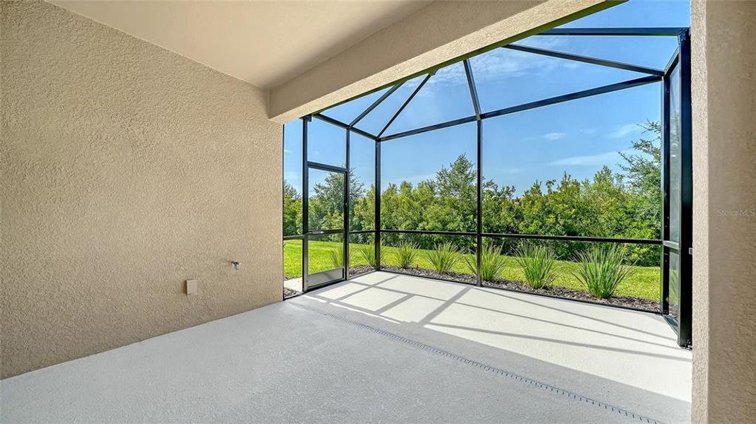 Exterior details and patio area of a home in Vicenza Real Estate and Homes for Sale in North Venice, FL - Neal Communities, Nokomis (Image 3).