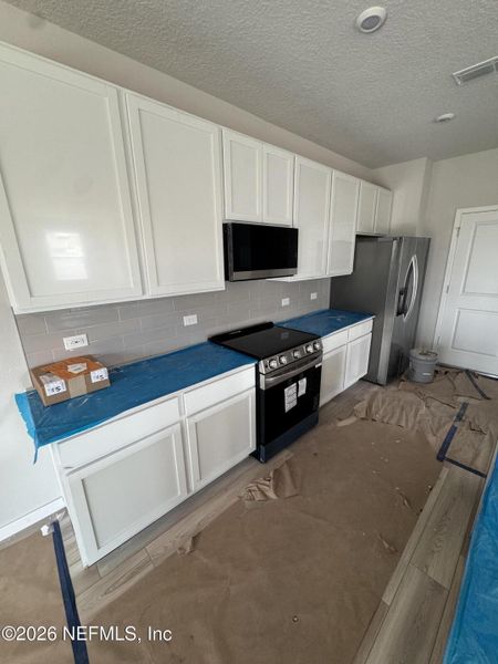 In-progress construction of a new home in The Landings at Pecan Park, Jacksonville, FL (Image 22). In-progress construction of a new home in The Landings at Pecan Park, Jacksonville, FL (Image 22).