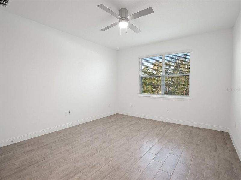 Spacious, unfurnished interior of a new home in Hills of Minneola, Minneola (Image 27). Spacious, unfurnished interior of a new home in Hills of Minneola, Minneola (Image 27).