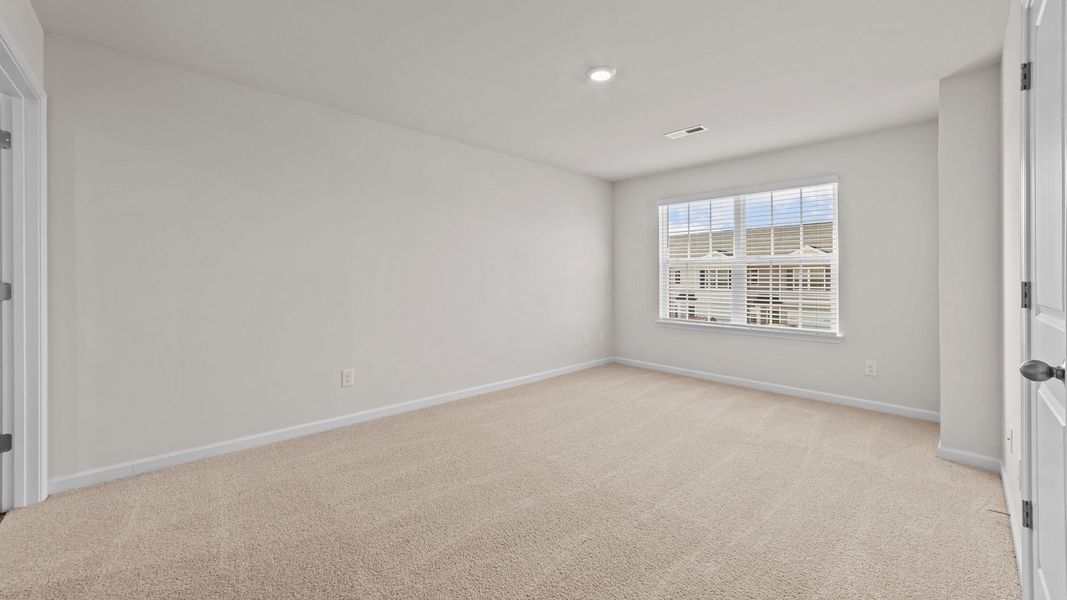 Representative unfurnished interior of a home built from the Pearson by D.R. Horton in The Townes at Carter Ridge, Greenville (Image 11).