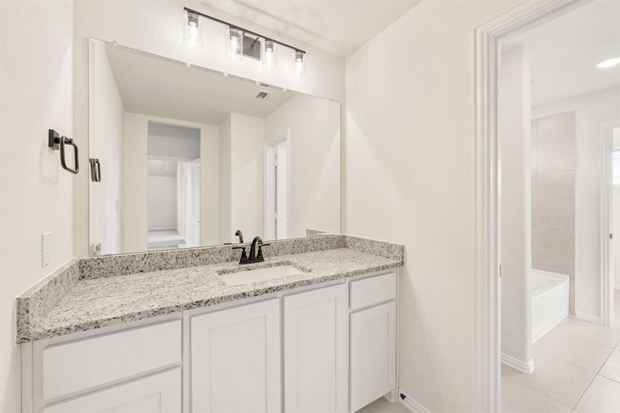 Furnished interior view inside a new home in Hunters Ridge, Crowley (Image 11).