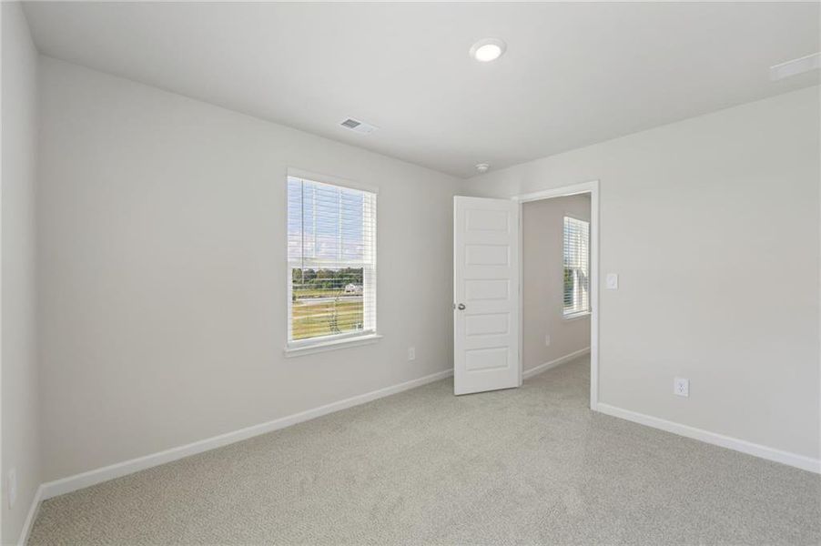 Spacious, unfurnished interior of a new home in Hemingway - Reserve Series, Cumming (Image 21).