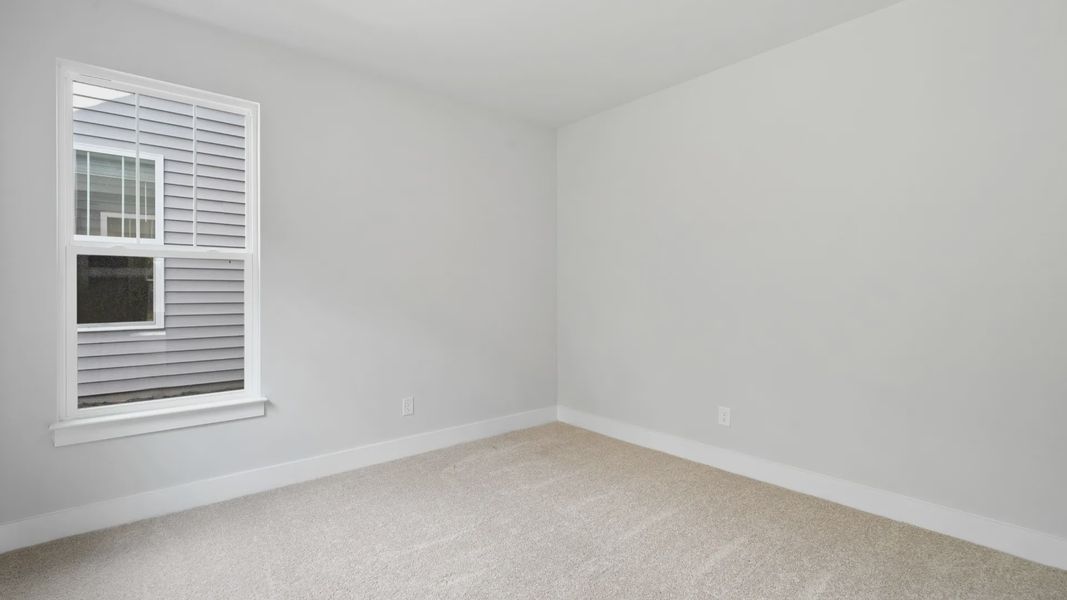 Representative furnished interior of a home built from the Stonefield - Finished Basement by DRB Homes in Pinebrook, Woodruff (Image 28).