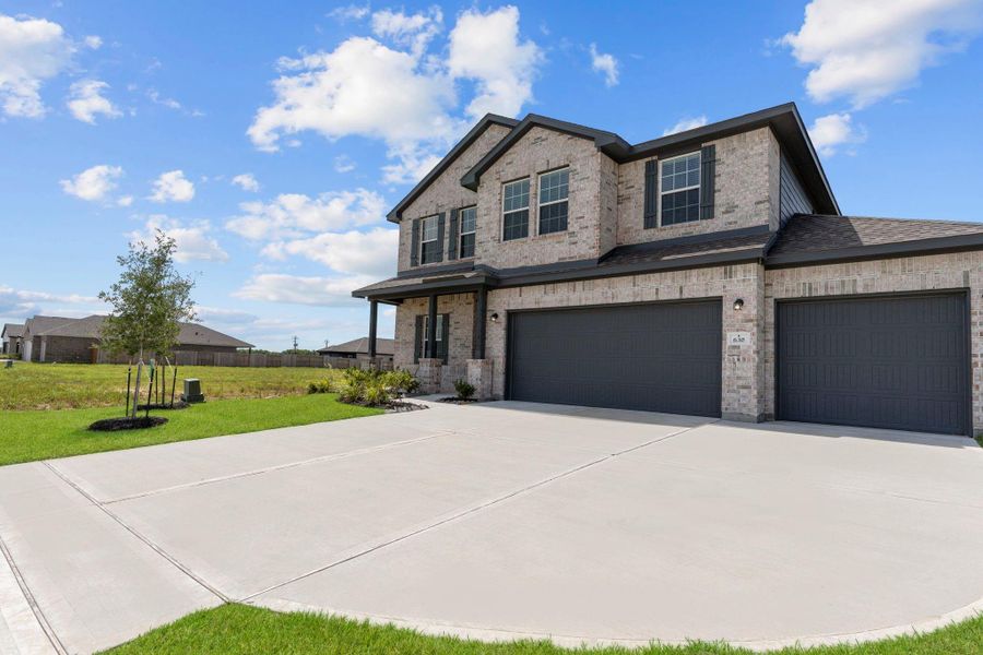 Expansive driveway with ample parking space, leading to your spacious 3-car garage. Expansive driveway with ample parking space, leading to your spacious 3-car garage.