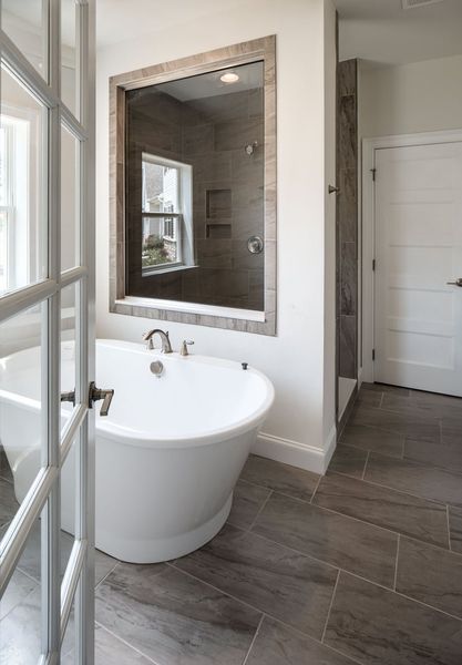 Representative furnished interior of a home built from the Arcadia by Keystone Custom Homes in Edgewater on Lake Tillery, Norwood (Image 5).