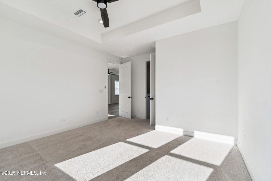 Spacious, unfurnished interior of a new home in Evergreen Island at Silverleaf - Classic, St. Augustine (Image 21).