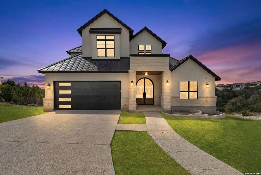 Front exterior of a new home in , Boerne, TX, highlighting curb appeal (Image 28).