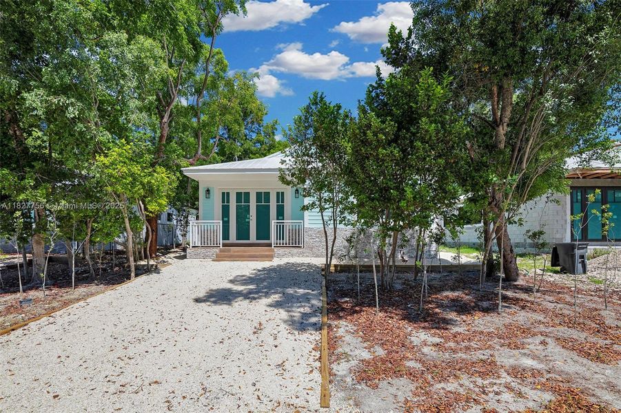 Front exterior of a new home in , Key Largo, FL, highlighting curb appeal (Image 26).