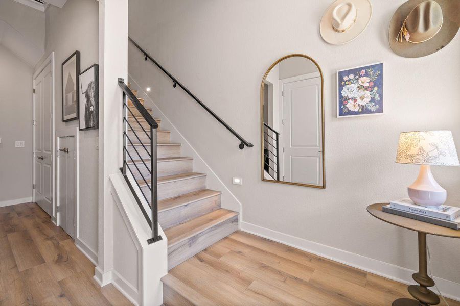 The gracious entry leads to the living, dining, kitchen, and primary suite. The gracious entry leads to the living, dining, kitchen, and primary suite.