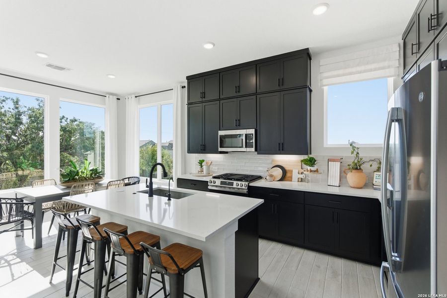 Furnished interior view inside a new home in Centero at Stone Oak, San Antonio (Image 26).
