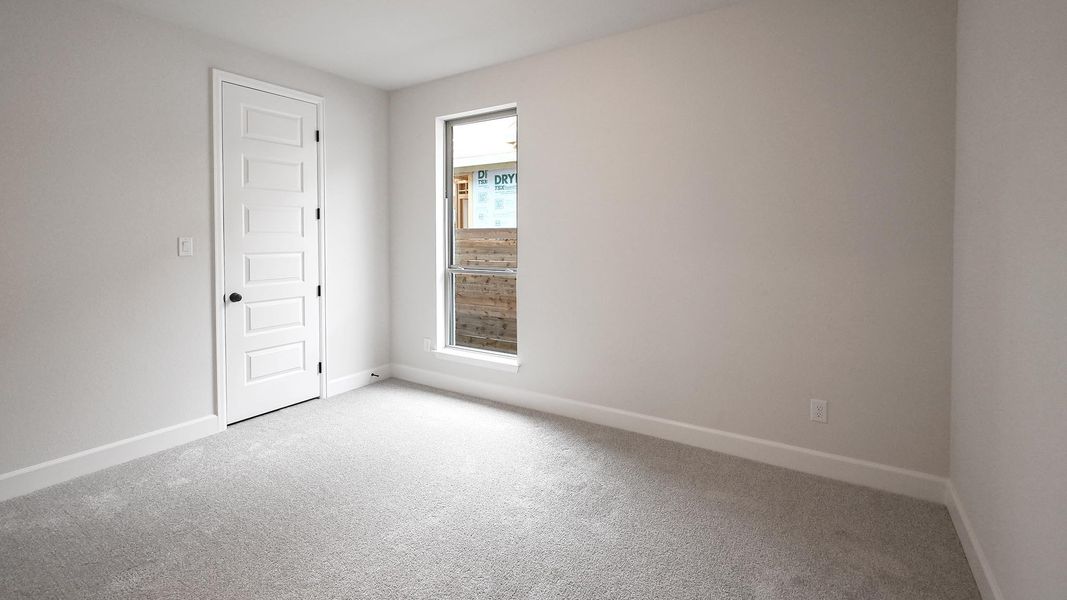 Spacious, unfurnished interior of a new home in Juniper Springs, Lockhart (Image 19).