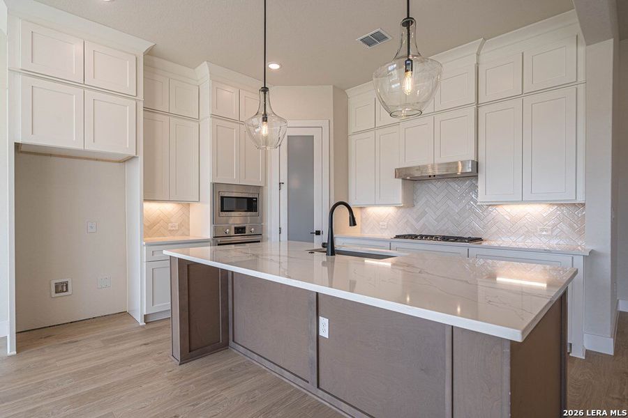 Furnished interior view inside a new home in , Kerrville (Image 7).