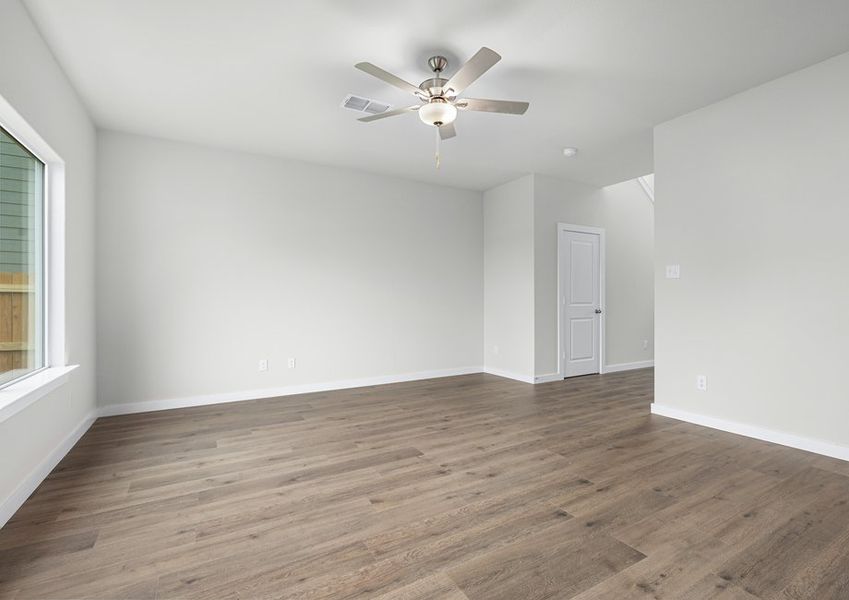 The family room is spacious and has plenty of room for furniture. The family room is spacious and has plenty of room for furniture.