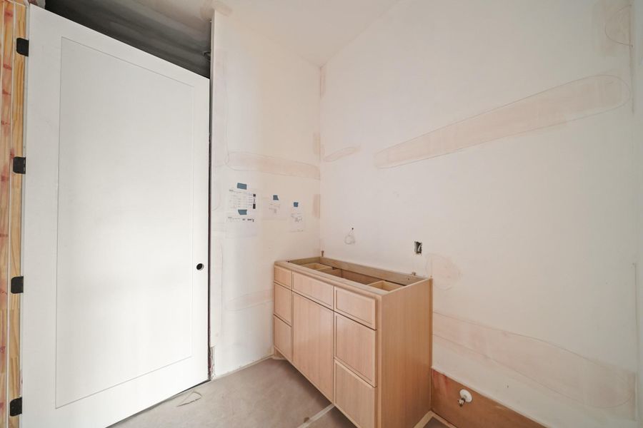 The office has direct access to the downstairs full guest bathroom!