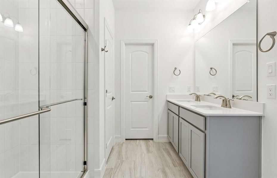 Modern owner's bath with spacious shower