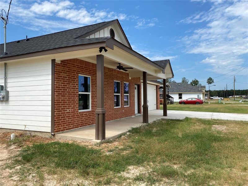 sit out and enjoy the breeze on your covered front porch