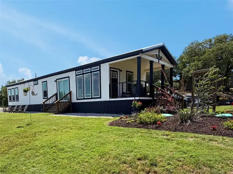 Exterior details and patio area of a home in , Runaway Bay (Image 22).