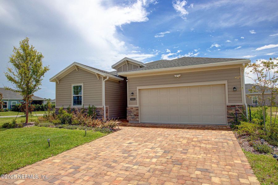 Front exterior of a new home in , Green Cove Springs, FL, highlighting curb appeal (Image 19).