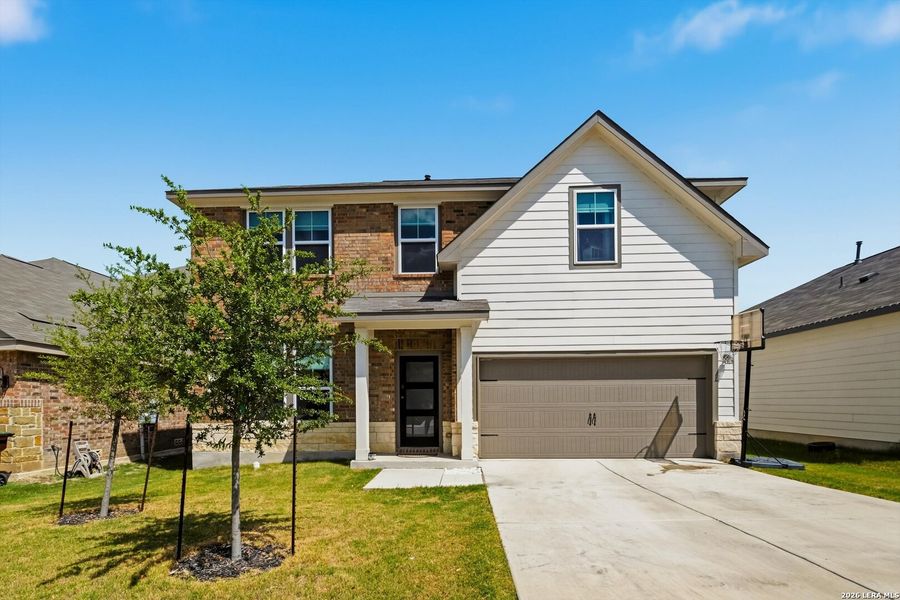 Front exterior of a new home in Horizon Pointe, Converse, TX, highlighting curb appeal (Image 22).