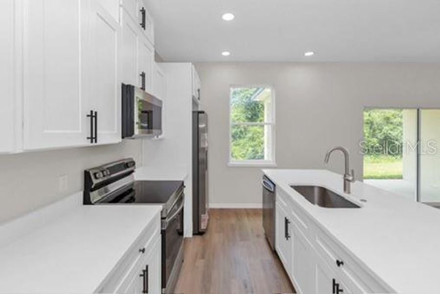 Furnished interior view inside a new home in , Deltona (Image 8).