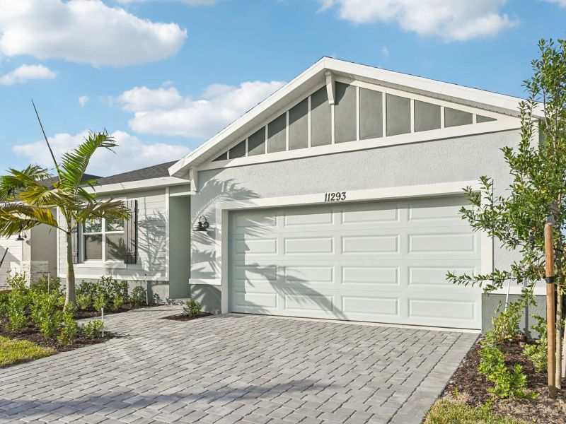 Front exterior of a new home in Brystol at Wylder - Reserve Series, Port St. Lucie, FL, highlighting curb appeal (Image 17).