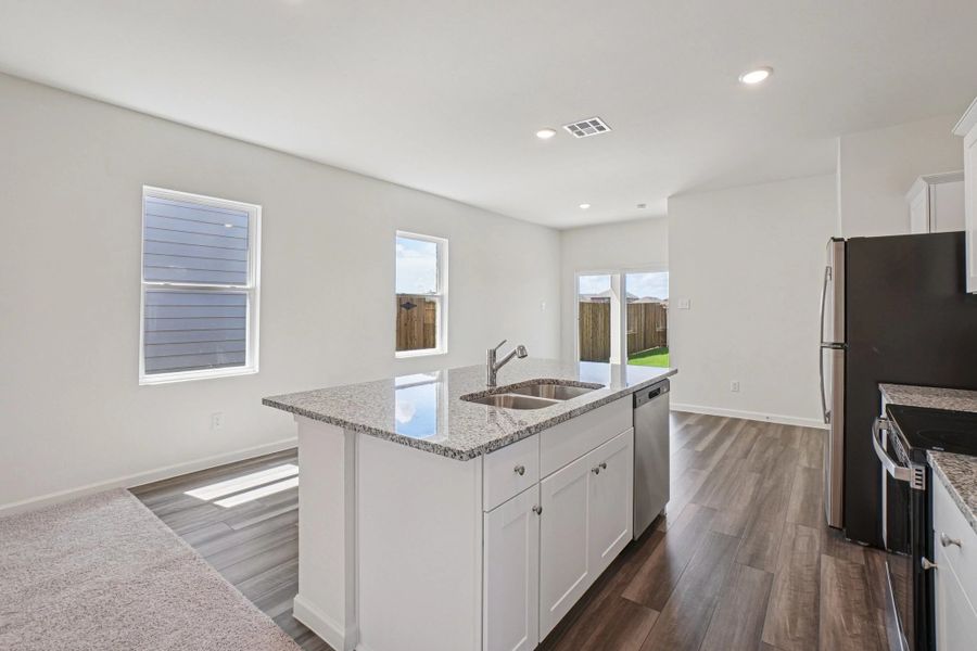 Representative furnished interior of a home built from the Odyssey by Starlight Homes in Williams Landing, Waller (Image 9).