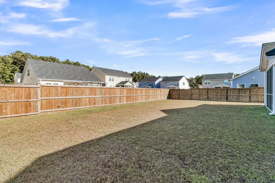 Exterior details and patio area of a home in Sweetgrass at Summers Corner: Arbor Collection, Summerville (Image 3). Exterior details and patio area of a home in Sweetgrass at Summers Corner: Arbor Collection, Summerville (Image 3).