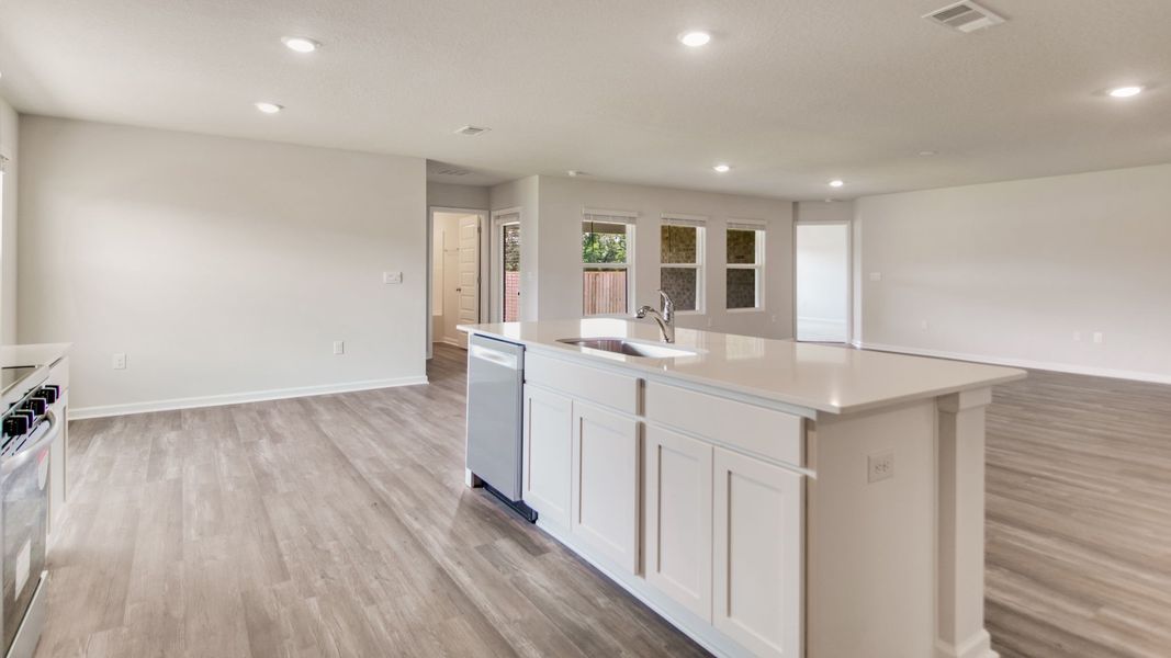 Furnished interior view inside a new home in The Enclave at Bar W Ranch, Baker (Image 7).