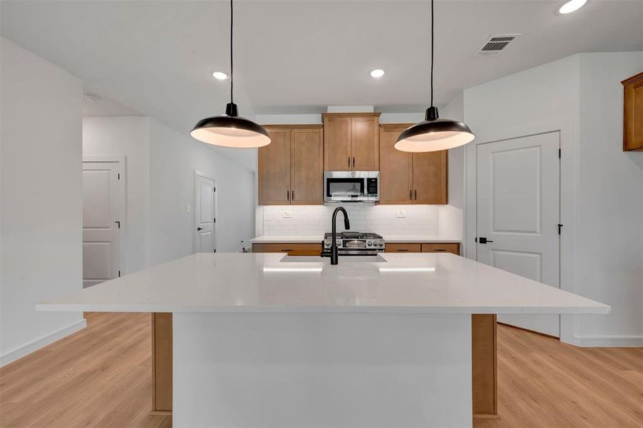 Furnished interior view inside a new home in Aspire at Reunion, Newark (Image 12).