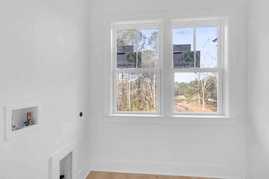 Spacious, unfurnished interior of a new home in , Awendaw (Image 12).