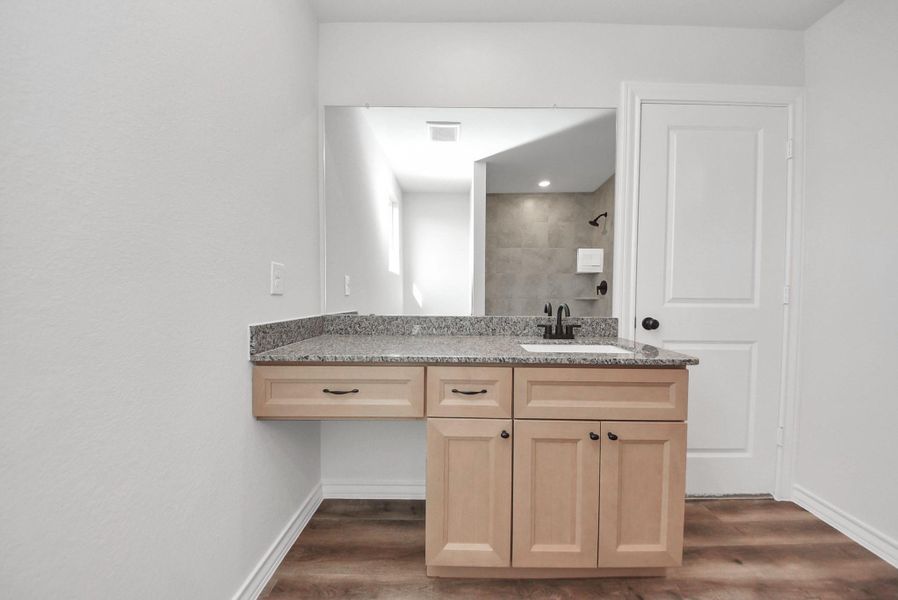 Furnished interior view inside a new home in Hill & Dale Ranch, Splendora (Image 19).