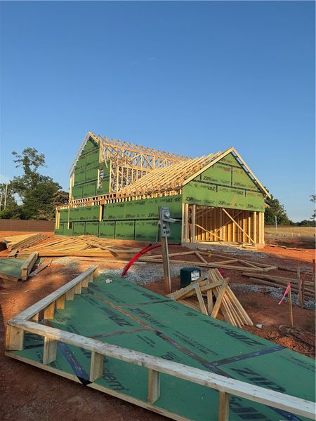 A newly framed structure under construction, showc