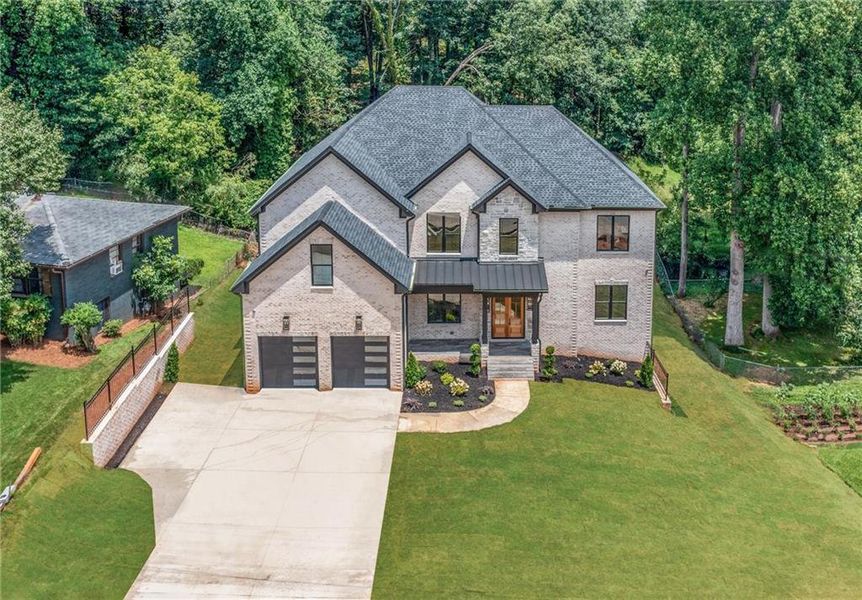 Front exterior of a new home in , Buford, GA, highlighting curb appeal (Image 26). Front exterior of a new home in , Buford, GA, highlighting curb appeal (Image 26).