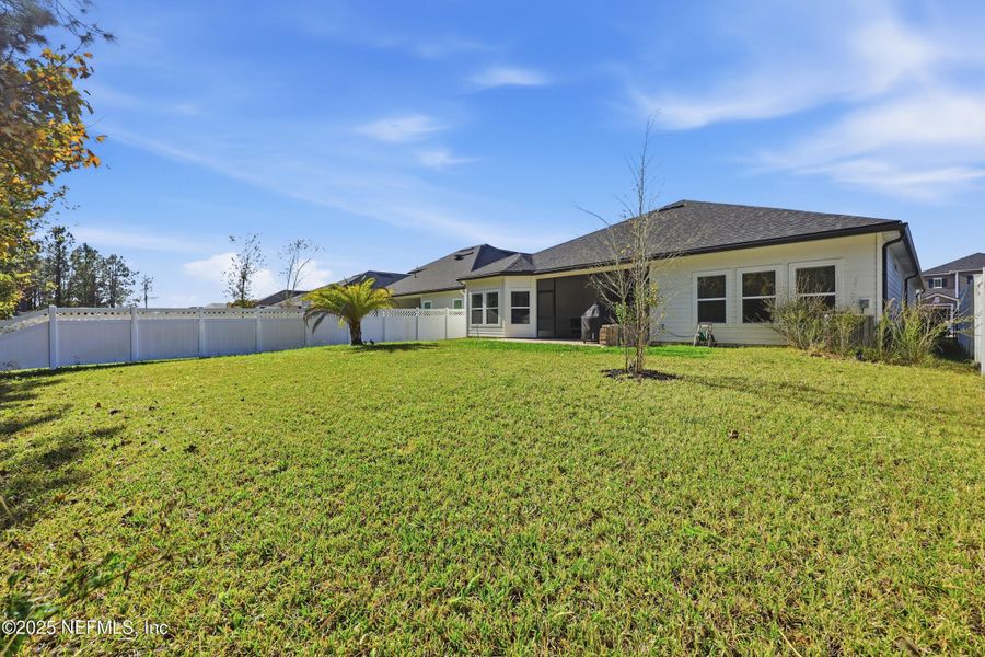 Exterior details and patio area of a home in Silver Landing at SilverLeaf, St. Augustine (Image 28).