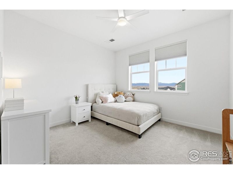 Secondary bedroom (bedroom 3) with beautiful mountain views and en-suite full bathroom