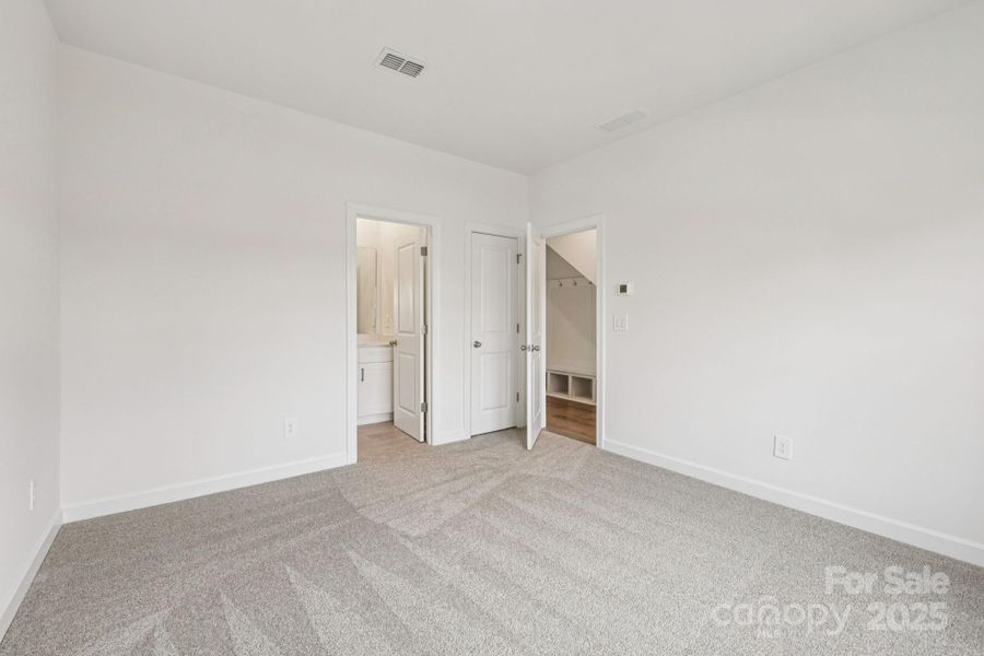 Spacious, unfurnished interior of a new home in Meadows at Wilson Farms - The Heights Series, Fort Mill (Image 31). Spacious, unfurnished interior of a new home in Meadows at Wilson Farms - The Heights Series, Fort Mill (Image 31).