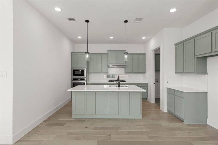 Furnished interior view inside a new home in The Villages of Hurricane Creek, Anna (Image 9).
