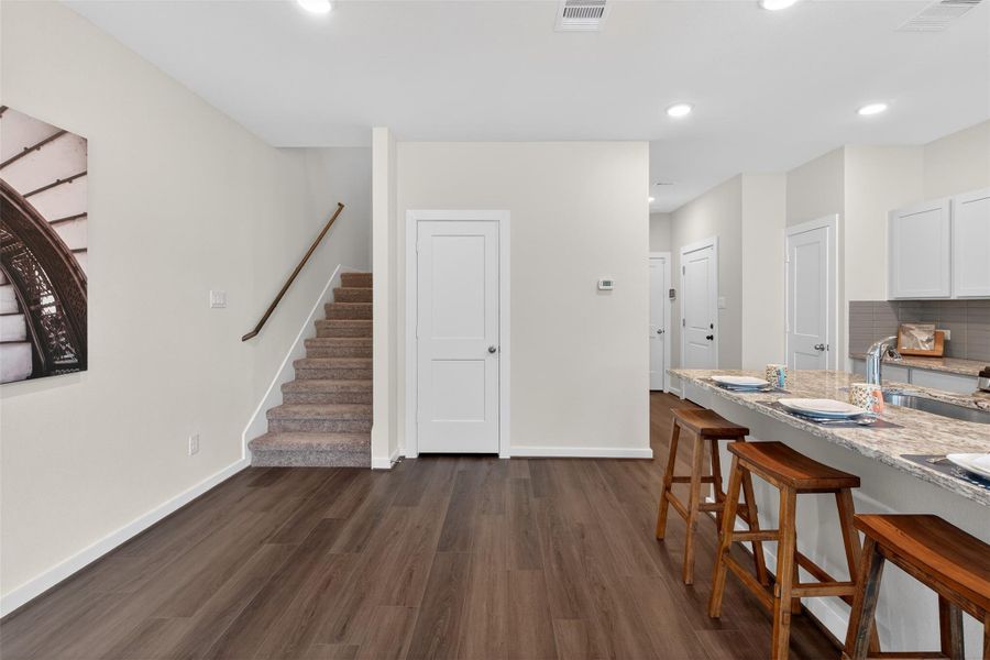 Efficient layout with convenient access to the upper level and a well-positioned kitchen that anchors the main floor. Efficient layout with convenient access to the upper level and a well-positioned kitchen that anchors the main floor.
